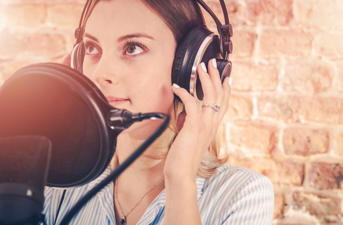 Voice-Over Actor in a Recording Studio